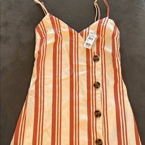Orange and white striped dress